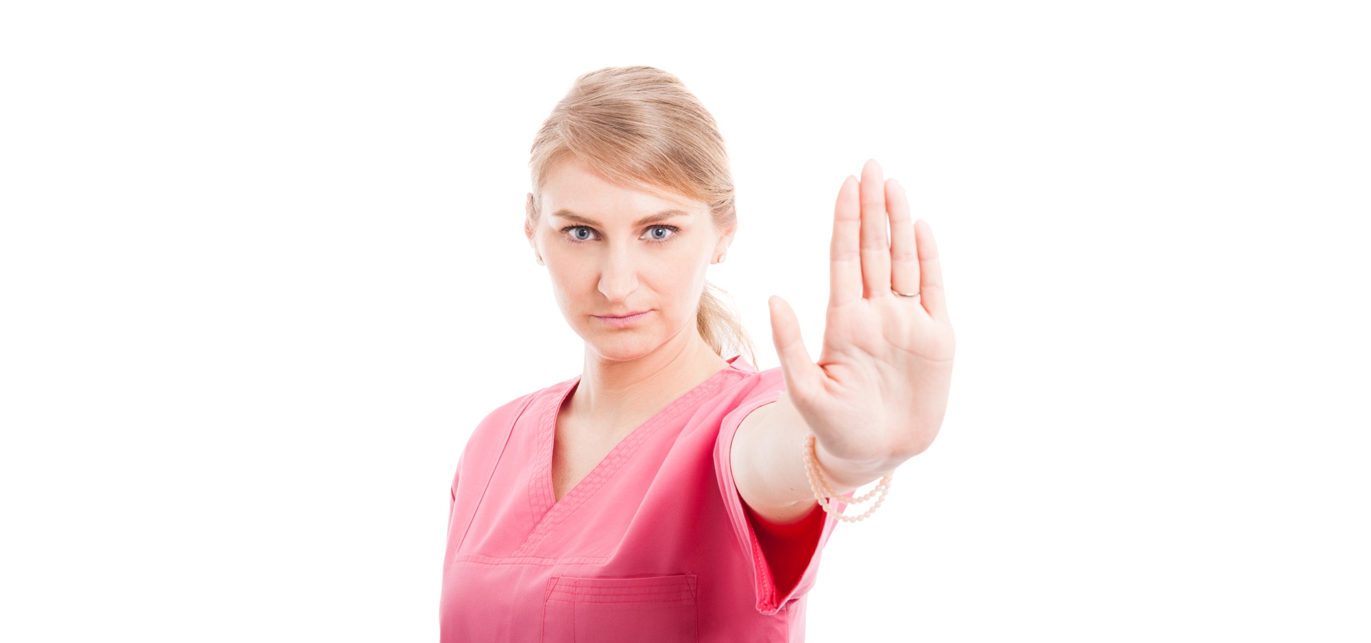 Nurse holding her hand up to stop workplace bullying.